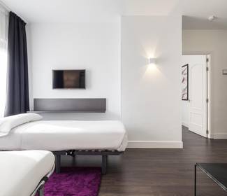 Quarto para quatro pessoas Hotel ILUNION Suites Madrid Quarto para quatro pessoas Hotel ILUNION Suites Madrid