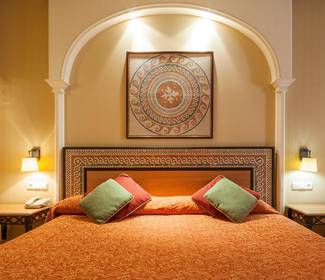 Quarto triplo Hotel ILUNION Mérida Palace