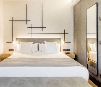 Quarto duplo superior com sala de estar Hotel ILUNION San Mamés Bilbao Quarto duplo superior com sala de estar Hotel ILUNION San Mamés Bilbao