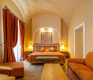 Quarto junior suite Hotel ILUNION Mérida Palace