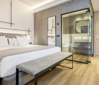 Quarto duplo superior com sala de estar hotel ilunion san mamés bilbao Quarto duplo superior com sala de estar hotel ilunion san mamés bilbao