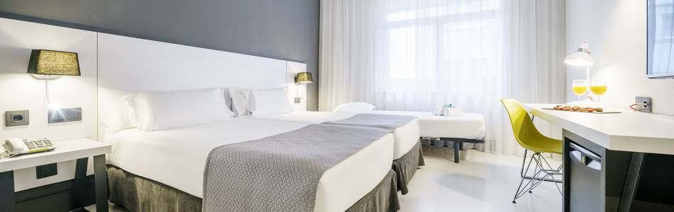 Quarto triplo Hotel ILUNION Bilbao Quarto triplo Hotel ILUNION Bilbao