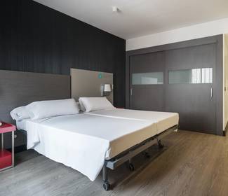 Quarto acessível Hotel ILUNION Suites Madrid Quarto acessível Hotel ILUNION Suites Madrid